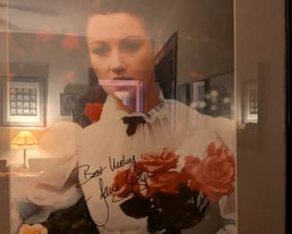 Framed color photo with a signature that appears to be from Jane Wyman, a versatile actress and singer who won an Oscar and was the first wife of Ronald Reagan.