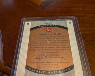 A unique piece of baseball history! This card contains a piece of authentic game-used material from Hall of Famer Early Wynn's pants. The relic is authenticated and guaranteed by The Upper Deck Company, making it a great addition to any collector's set.