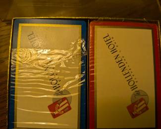 This is a rare and unique piece of history from a bygone era! This set includes two decks of still-sealed playing cards from the famous Hollenden Hotel in Cleveland, Ohio, along with a special promotional token from the hotel's "Vogue Room." The Hollenden was a glamorous luxury hotel that hosted presidents and celebrities before it was demolished. This is a must-have for a collector of vintage hotel memorabilia, Cleveland history, or unique advertising tokens.