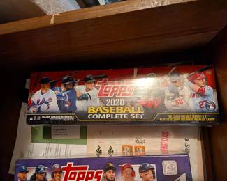 This is a fantastic opportunity for any baseball fan or card collector to get a complete, factory-sealed set of Topps baseball cards. Each box contains every base card from the Series 1 and Series 2 releases of the specified year, making them a perfect way to own a complete collection of that season's top stars and key rookies. These sets are ideal for a hobbyist, a fan who wants to follow their favorite players, or a gift for a young baseball enthusiast.