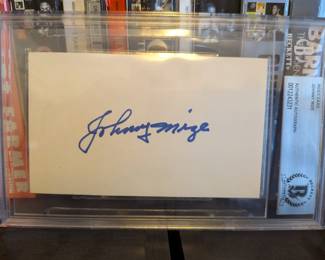 This is a rare opportunity to own a piece of baseball history! This index card features a clear, authentic autograph from Hall of Fame first baseman and legendary slugger Johnny Mize. The signature is certified as genuine by Beckett Authentication Services (BAS), one of the most trusted names in sports memorabilia authentication. This piece comes in a sealed, protective case and is a must-have for any serious collector.