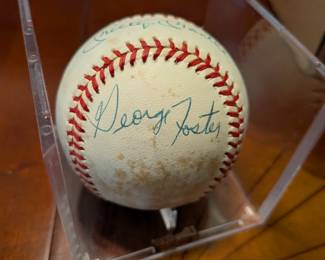 An extraordinary piece of baseball history! This official league baseball is a must-have for a serious collector, featuring the signatures of two Hall of Famers, Mickey Mantle and Whitey Ford, as well as baseball legends Johnny Mize, Bobby Richardson, Tony Kubek, George Foster, and Bobby Brown. This multi-signed ball is a rare and highly desirable collectible, a true centerpiece for any sports memorabilia collection.