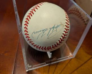An extraordinary piece of baseball history! This official league baseball is a must-have for a serious collector, featuring the signatures of two Hall of Famers, Mickey Mantle and Whitey Ford, as well as baseball legends Johnny Mize, Bobby Richardson, Tony Kubek, George Foster, and Bobby Brown. This multi-signed ball is a rare and highly desirable collectible, a true centerpiece for any sports memorabilia collection.