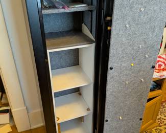 Secure your valuables with this sturdy Sports Afield "Yosemite" gun safe. Designed for security and fire protection, this safe features a programmable electronic lock and a durable steel construction. With a fully convertible interior, it's perfect for safely storing firearms, jewelry, documents, and other important items. A great addition to any home for peace of mind.