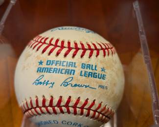 An extraordinary piece of baseball history! This official league baseball is a must-have for a serious collector, featuring the signatures of two Hall of Famers, Mickey Mantle and Whitey Ford, as well as baseball legends Johnny Mize, Bobby Richardson, Tony Kubek, George Foster, and Bobby Brown. This multi-signed ball is a rare and highly desirable collectible, a true centerpiece for any sports memorabilia collection.