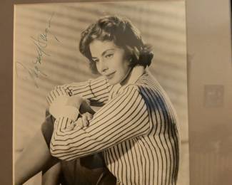 Framed black-and-white photo with a signature that appears to be from Ingrid Bergman, a three-time Academy Award-winning actress and one of the greatest stars of all time.
