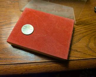 This is a rare and unique piece of history from a bygone era! This set includes two decks of still-sealed playing cards from the famous Hollenden Hotel in Cleveland, Ohio, along with a special promotional token from the hotel's "Vogue Room." The Hollenden was a glamorous luxury hotel that hosted presidents and celebrities before it was demolished. This is a must-have for a collector of vintage hotel memorabilia, Cleveland history, or unique advertising tokens.