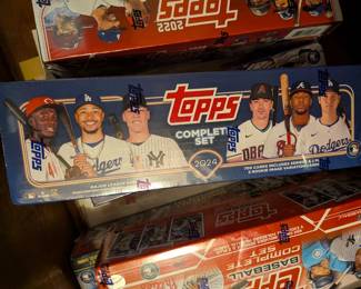 This is a fantastic opportunity for any baseball fan or card collector to get a complete, factory-sealed set of Topps baseball cards. Each box contains every base card from the Series 1 and Series 2 releases of the specified year, making them a perfect way to own a complete collection of that season's top stars and key rookies. These sets are ideal for a hobbyist, a fan who wants to follow their favorite players, or a gift for a young baseball enthusiast.