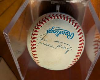 An extraordinary piece of baseball history! This official league baseball is a must-have for a serious collector, featuring the signatures of two Hall of Famers, Mickey Mantle and Whitey Ford, as well as baseball legends Johnny Mize, Bobby Richardson, Tony Kubek, George Foster, and Bobby Brown. This multi-signed ball is a rare and highly desirable collectible, a true centerpiece for any sports memorabilia collection.