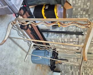 Metal table with glass top and shelf