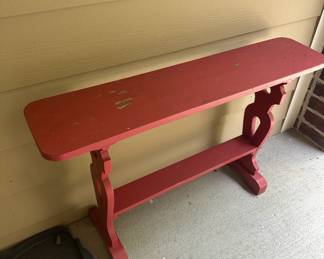 Red painted bench