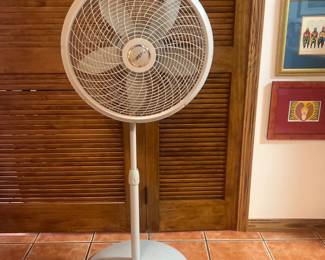 Lasko white oscillating pedestal fan with adjustable height and three-speed settings.