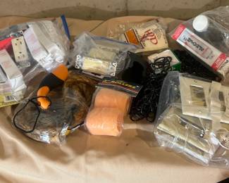 Lot of electrical outlets, switches, cover plates, rollers, caulk, rope, and more.
