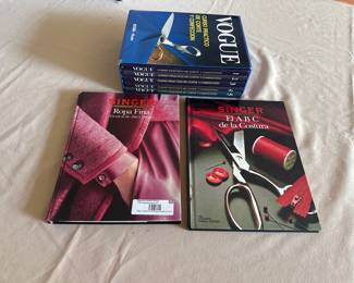 Lot of 7 books on sewing and haute couture from Vogue and Singer.