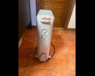 Honeywell space heater with adjustable heat settings and built-in safety features.