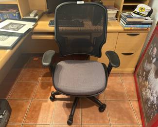 Ergonomic mesh back swivel office chair.