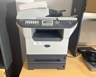 Business-class Brother MFC-8460N laser printer with scan, copy, and fax functions.