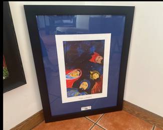 Framed art print “Reyes” by J. Becerril with blue mat and black frame.