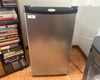 Whirlpool compact stainless steel mini fridge.