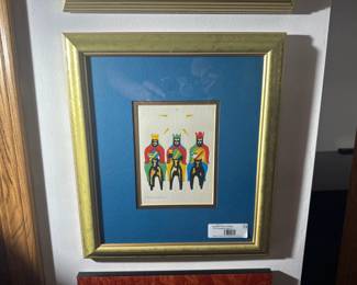 Framed signed print of the Three Kings in colorful design.