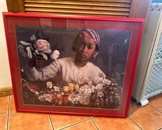 Framed signed 1970 artwork of girl with flowers, red frame.