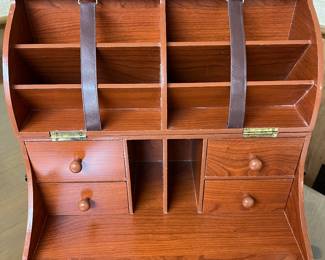 Lovely and unusual tabletop desk! AND it closes up so yu can carry it with you! AWESOME! Solid cherry.