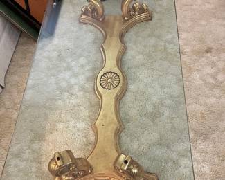 I am NUTS about this beautiful unusual and like new coffee table! Italianate gold wooden base, with a perfect glass top...it makes a statement to ANyone who enters the room! SO classy and different!