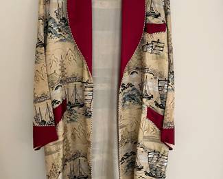This Japanese Wedding coat was brought back to the U.S. in the 1950s by the owner of this home! It is hand painted and perfect! Gorgeous colors, you have to see it in person...would be beautiful framed on a wall, OR wear it out for the evening...it's a beautiful piece of history!