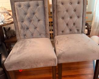 2 gray upholstered chairs 