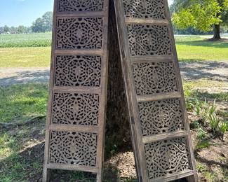 3 wood screens. Each screen has 4 panels