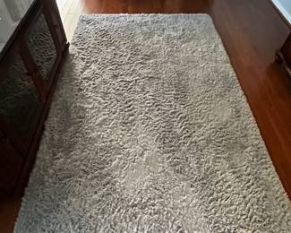 plush grey rug perfect for bedroom