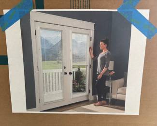 Two door blind- as pictured. Unopened & never installed!