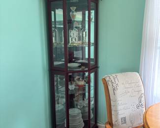 Beautiful corner curio cabinet!