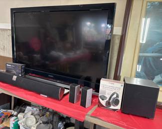 Large TV, Roku, Soundbar with subwoofer system