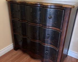 Three drawer dresser with palm tree accents on front