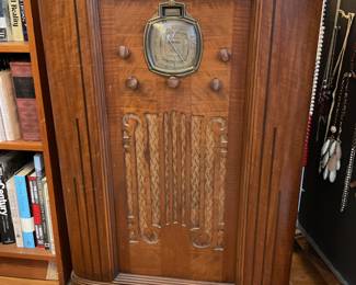 Functioning silver tone radio 1940s 37” x 23” x 12” $480 + tax