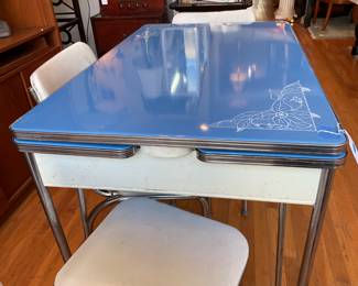 Extendable blue 1950s table 31” tall x 40” long $480 + tax