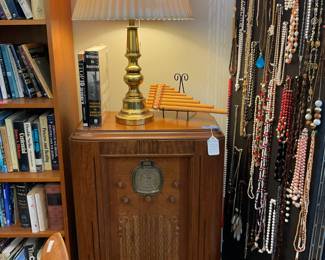 Functioning silver tone radio 1940s 37” x 23” x 12” $480 + tax