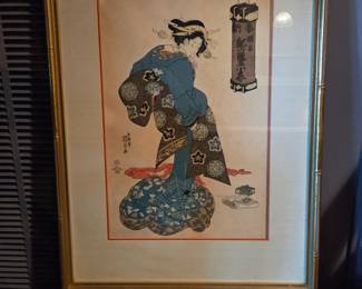 Late 18th century Color Woodblock print.  Artist; Kitagawa Utamaro. Detail she spys a spider on her costume!