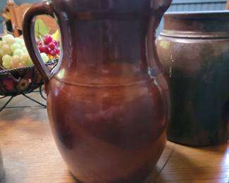 Stoneware Pitcher late 19th century.  11" Tall