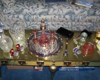 GLASS & MISC. ON BRASS COFFEE TABLE