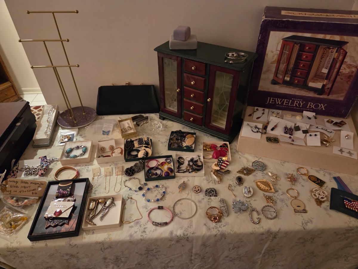 Just some of the costume and fine jewelry and Jewelry-related items we have for sale like a necklace display and a whole jewelry standing cabinet and table cabinet, pictured!