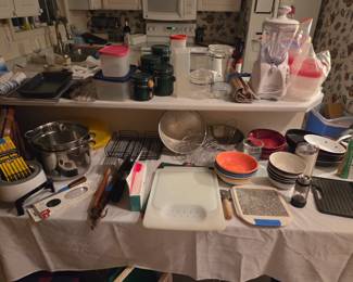 Some of the kitchen Tupperware, containers, pots, pans, and cooking utensils we will have for sale!