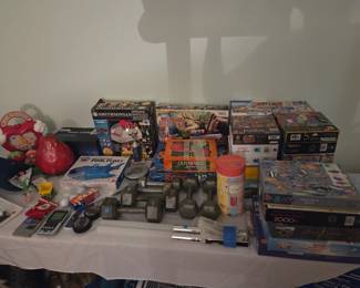 games, weights, and other small fun items including some Wii remote holders.