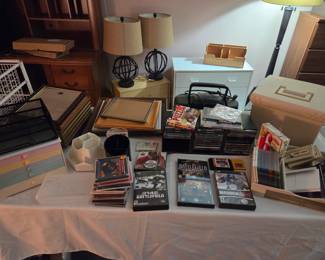 Computer games, lamps, frames, CDs and keyboards pictured.