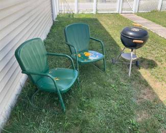 Vintage metal lawn chairs they are old, barbecue grill