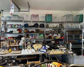 All the shelves in the garage are for sale, including these four chrome racks