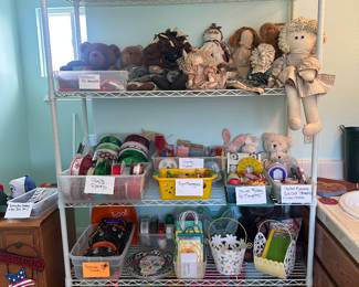 Deluxe ribbons by the dozens,  fabric dolls Decor, paper, lanterns and the rack is for sale as well