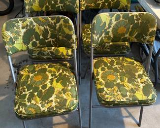 Set four folding chairs with vintage vinyl are like new!