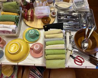 Kitchen towels, flatware, assorted fiesta dishes
